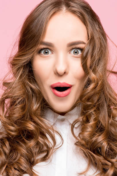 istock Surprised happy beautiful woman looking in excitement. 1070594698
