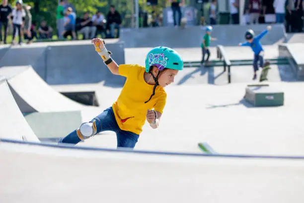 Photo of Young Girl Skateboarding in Skatepark
