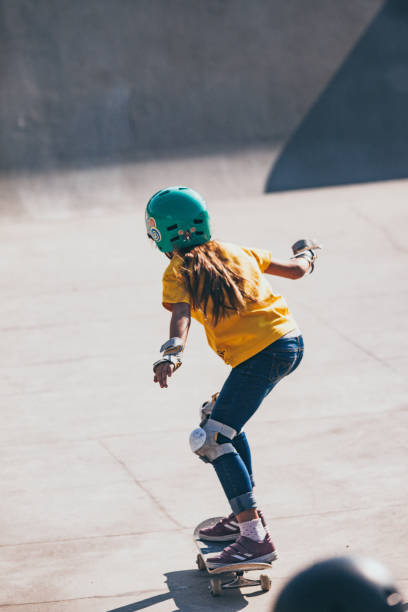 istock Young Girl Skateboarding 1070595806