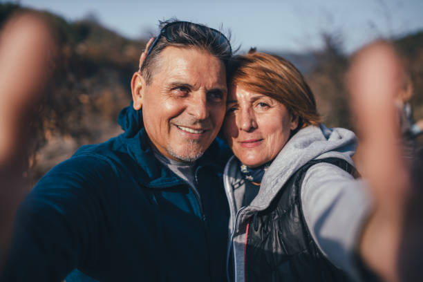 istock Senior couple taking selfie 1070596156
