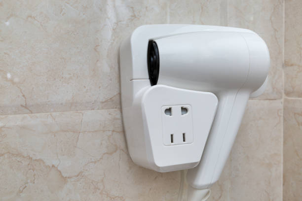 istock Hotel hand hairdryer on wall 1070608656