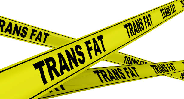 trans fat. yellow warning tapes - trans fats imagens e fotografias de stock