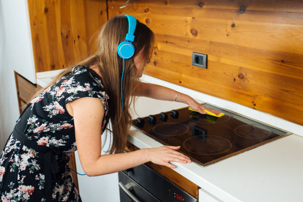 istock Beautiful Housewife Working in the Kitchen 1070625890