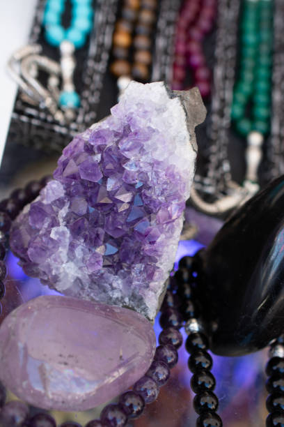 istock Raw violet amethyst rock with crystal ametist 1070629306