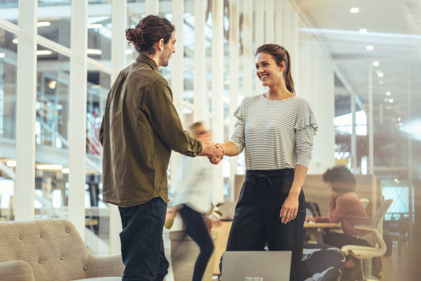 istock Business people shaking hands in office 1070632516