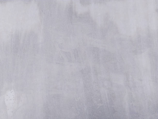istock gray concrete wall background texture clean stucco fine grain cement clear and smooth white polished. 1070637358