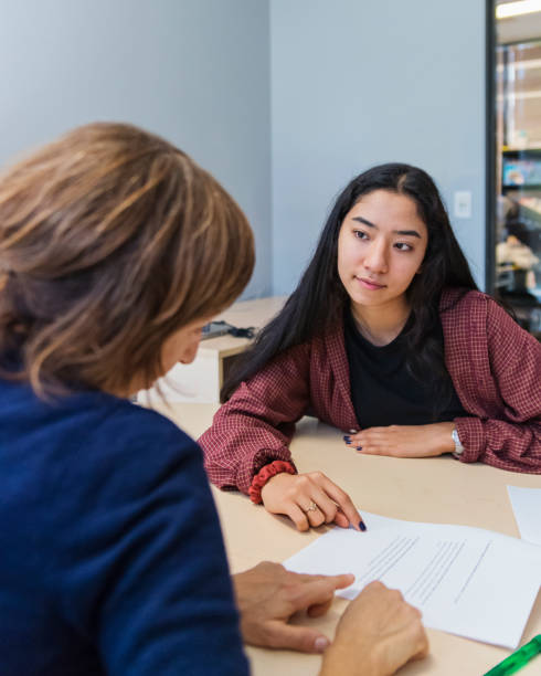 istock Counselling appointment for College student. 1070639394