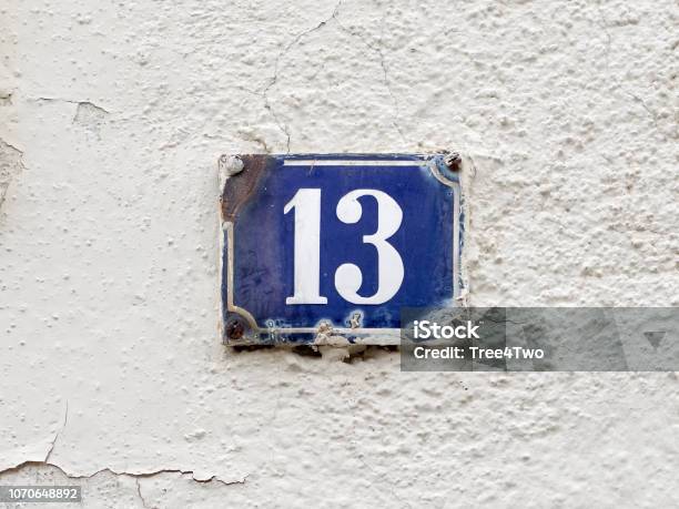 Oldfashioned Enamel Sign With House Number 13 Stock Photo - Download Image Now - Blue, Color Image, Dirty