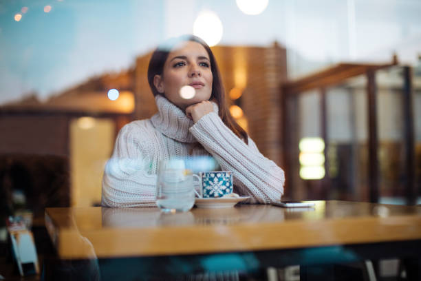 istock Young woman in cafe 1070655228