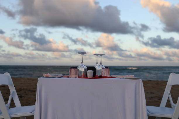 istock Romantic dinner on the beach by the ocean 1070665528