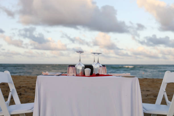 istock Romantic dinner on the beach by the ocean 1070665544