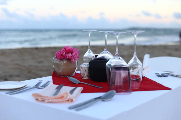 istock Romantic dinner on the beach by the ocean 1070665556