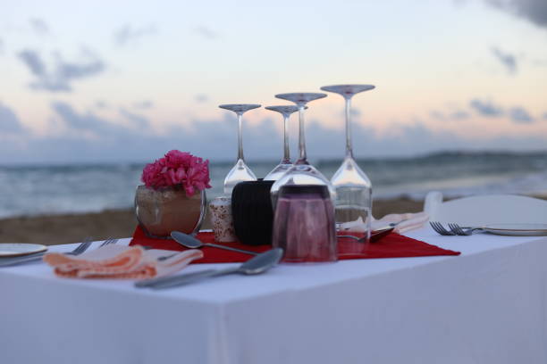 istock Romantic dinner on the beach by the ocean 1070665598