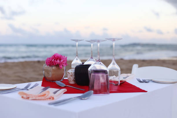 istock Romantic dinner on the beach by the ocean 1070665632