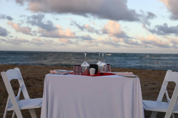 istock Romantic dinner on the beach by the ocean 1070665652