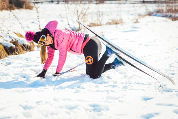 istock Woman falling while doing cross country skiing 1070665680