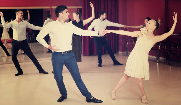 istock People practicing vigorous lindy hop movements 1070671424