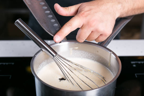 istock Chef prepairing tart filling 1070674586