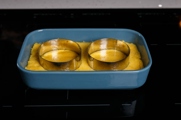 istock Polenta with cutting shapes on it in a blue bowl 1070674876