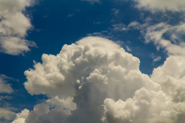 White clouds on blue sky background in sunny day summer time
