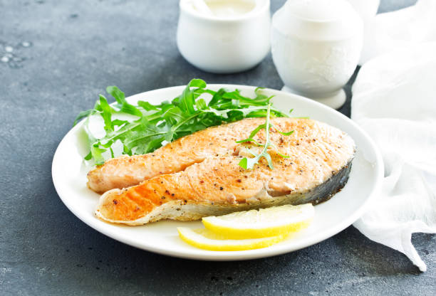 istock grilled salmon steak with cream sauce. 1070685662