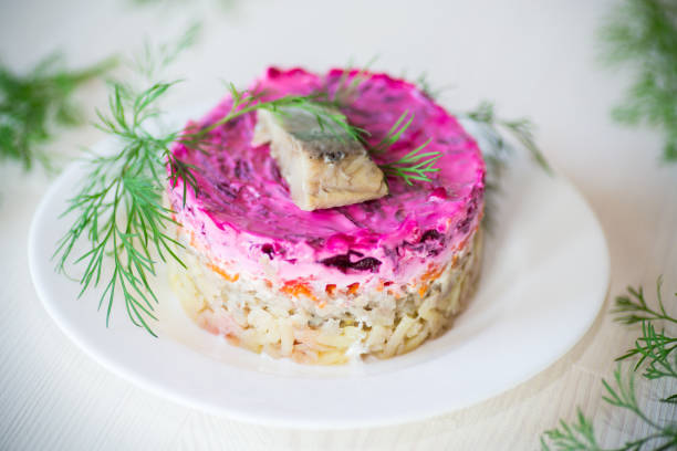 istock layered salad of boiled vegetables with beets and herring 1070693240