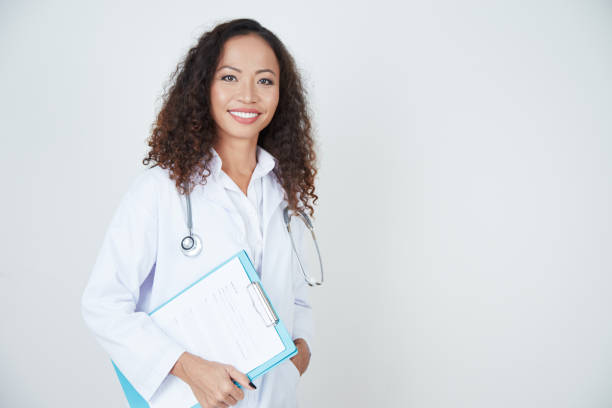 istock Doctor standing with health card 1070693864