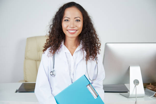 istock Female doctor at her office 1070694652