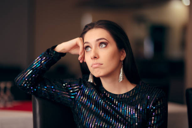 istock Sad Bored Glamorous Woman Having No Fun at Party 1070695778