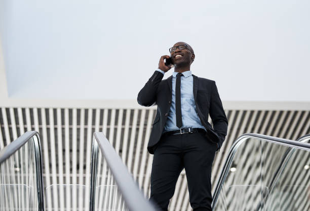 Cropped shot of a handsome businessman talking on his cellphone