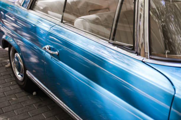 istock Side doors of a blue vintage car 1070701330