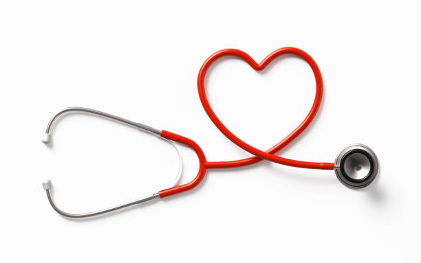 coração em forma de estetoscópio no fundo branco - equipment listening red stethoscope - fotografias e filmes do acervo
