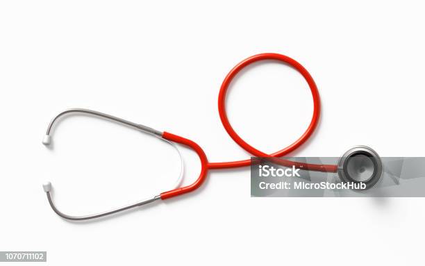 Red Stethoscope On White Background Stock Photo - Download Image Now - Stethoscope, Cut Out, White Background