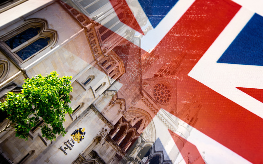 The Royal Courts of Justice blended with a UK Union flag.