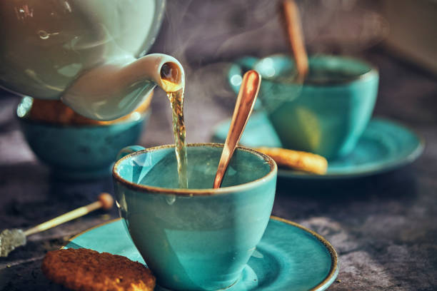 istock Cup of Black Tea Served with Biscuits 1070717828