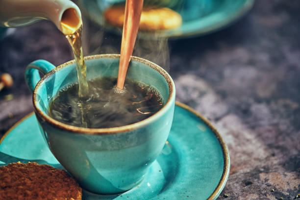 istock Cup of Black Tea Served with Biscuits 1070717858