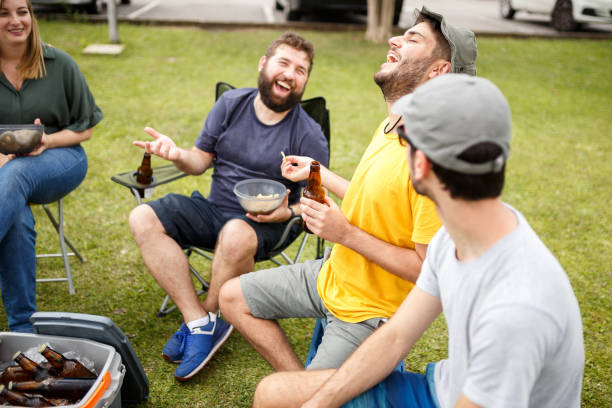 istock Group of people tailgating and drinking beer 1070724982