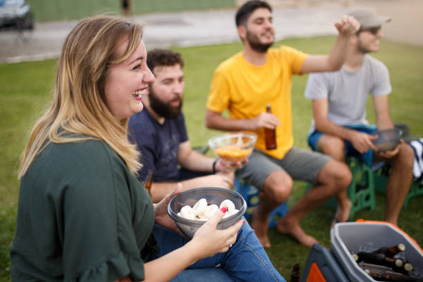istock Group of people tailgating and drinking beer 1070725032