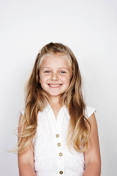 Portrait of girl smiling  one girl only stock pictures, royalty-free photos & images