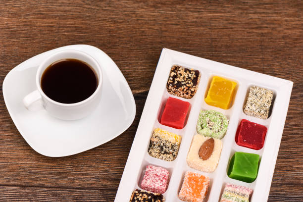 istock Black coffee and varied Turkish delight on a wooden table 1070726384