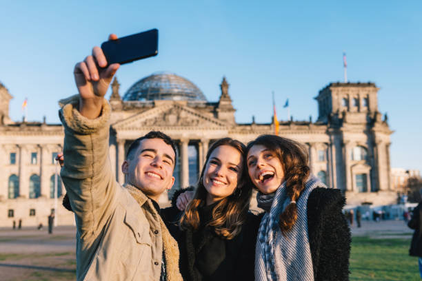 istock three young tourists taking selfie in berlin 1070727822