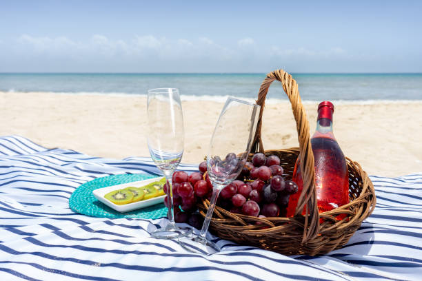 istock Beach picnic with wine and grapes 1070754938