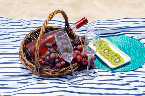 istock Beach picnic with wine and grapes 1070757122