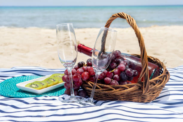 istock Beach picnic with wine and grapes 1070757774