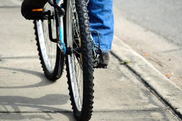 istock Bike rider on sidewalk 1070763566