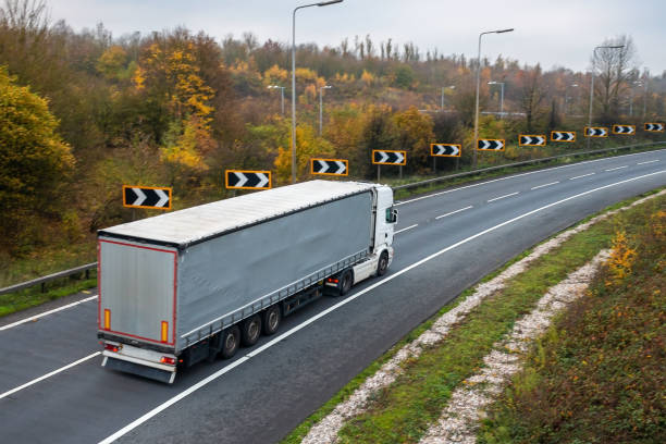 istock Articulated lorry in motion on the road 1070764188