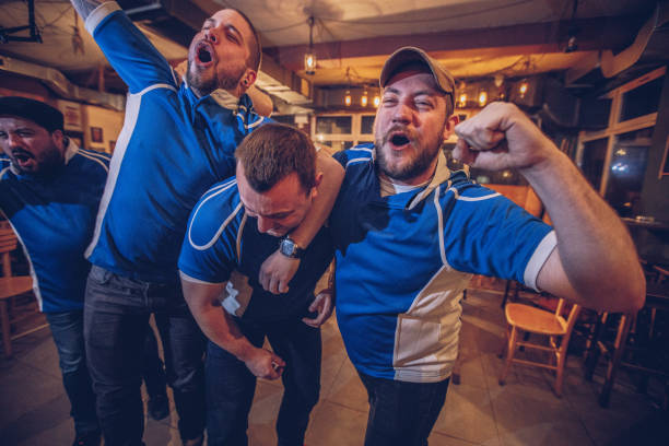 istock Friends in sports pub 1070765972