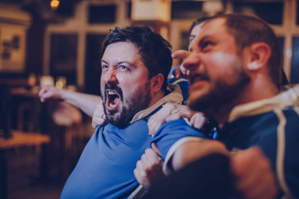 istock Men in sports pub 1070766180