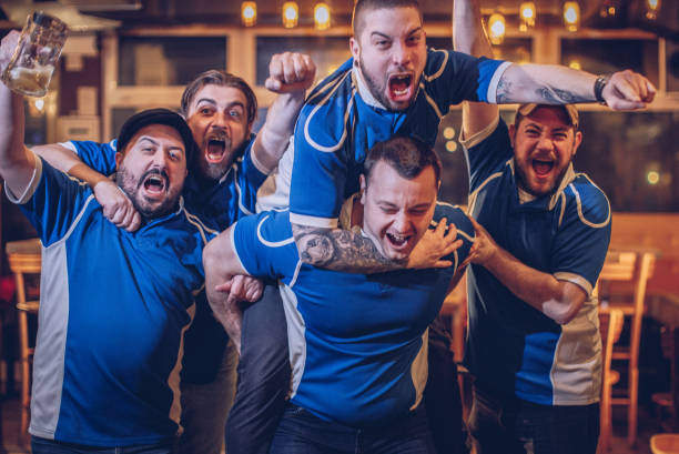 istock Men in sports bar 1070767508