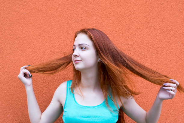 istock Red hair girl 1070770062
